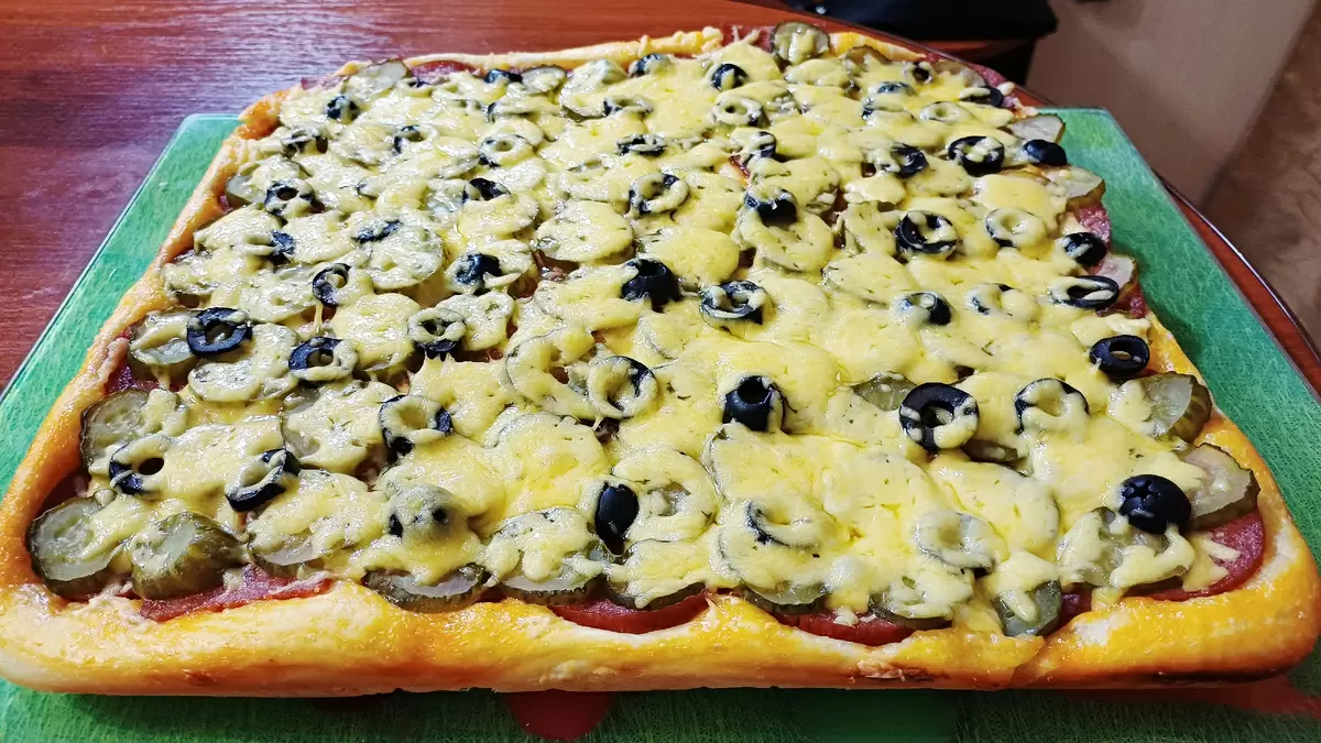 Как приготовить идеальную домашнюю пиццу: простой рецепт